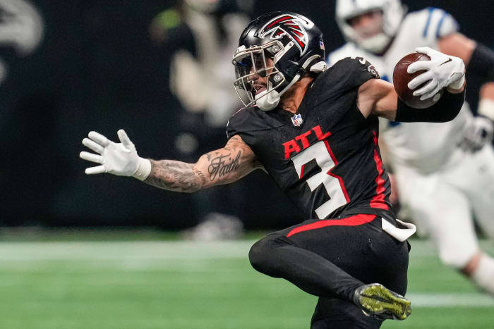 Atlanta Falcons safety Jessie Bates III (3) runs after intercepting a pass against the Indianapolis Colts during the second half at Mercedes-Benz Stadium.